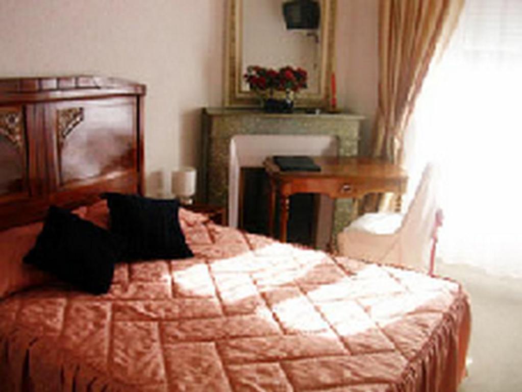 Arcantis Hotel Metropole Шатель-Гюїон Номер фото